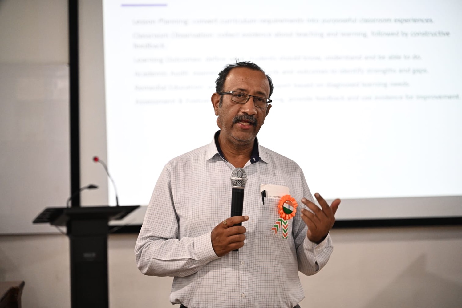 Faculty member presenting the academic quality module