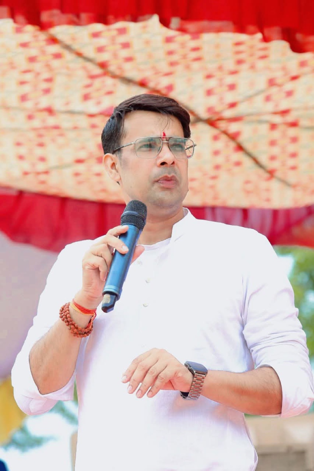 Dr. Navdeep Bhardwaj speaking at an association gathering