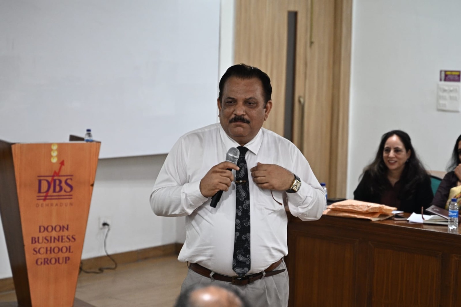 A participating principal speaking during the open floor