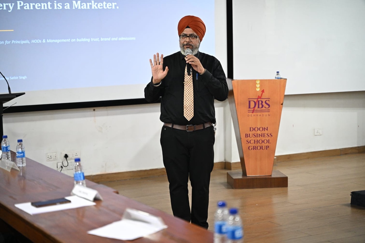 Satbir Singh presenting a session on parents and school branding